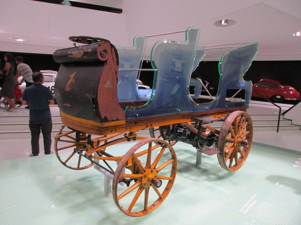 Exact 1898 Egger-Lohner C.2 Phaeton electric vehicle at the Porsche Museum; not the later Lohner-Porsche wheel-hub car.