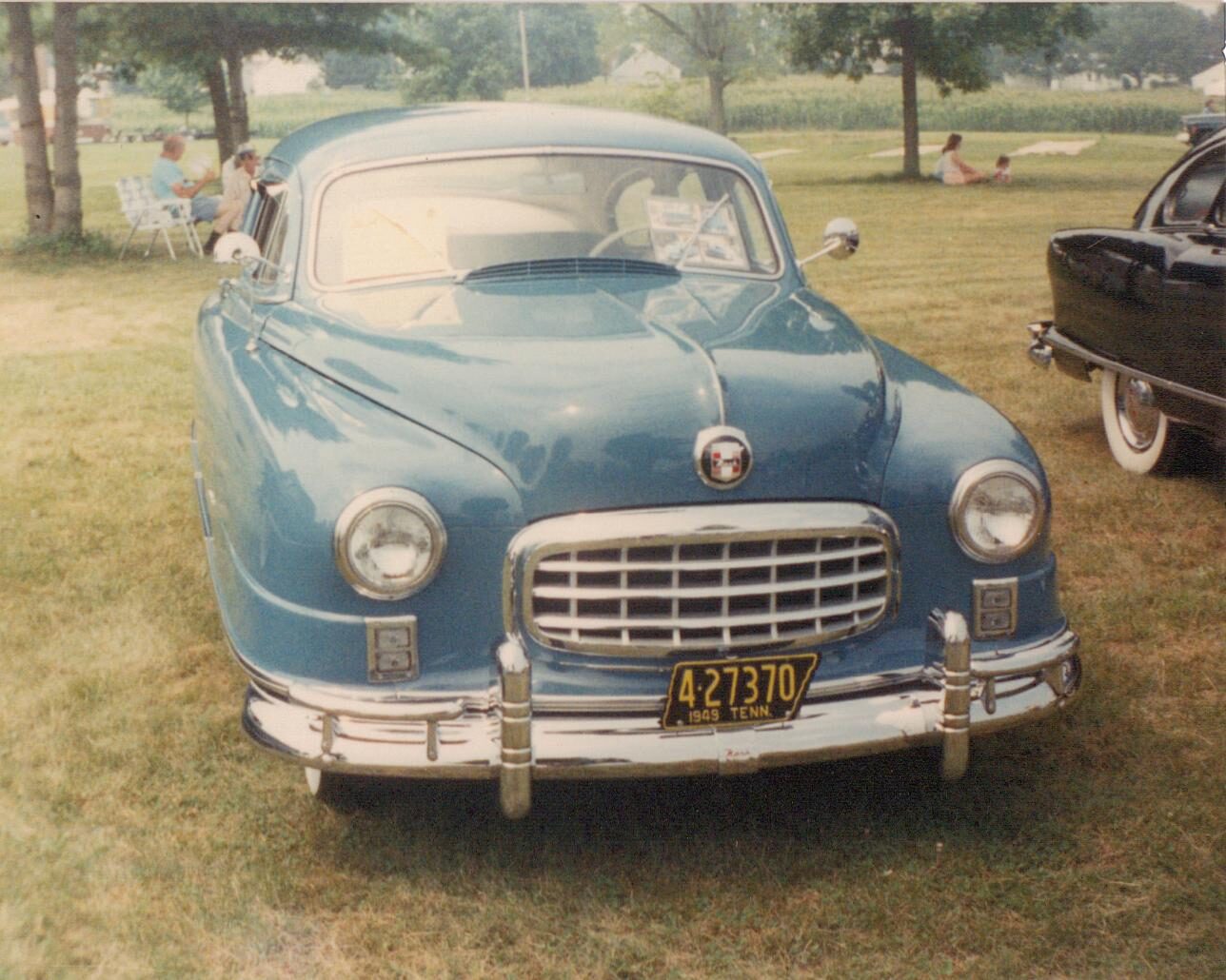 Exact 1949 Ambassador Airflyte body family; source does not verify Custom trim or three-speed transmission, so the cover must be labeled representative for trim.