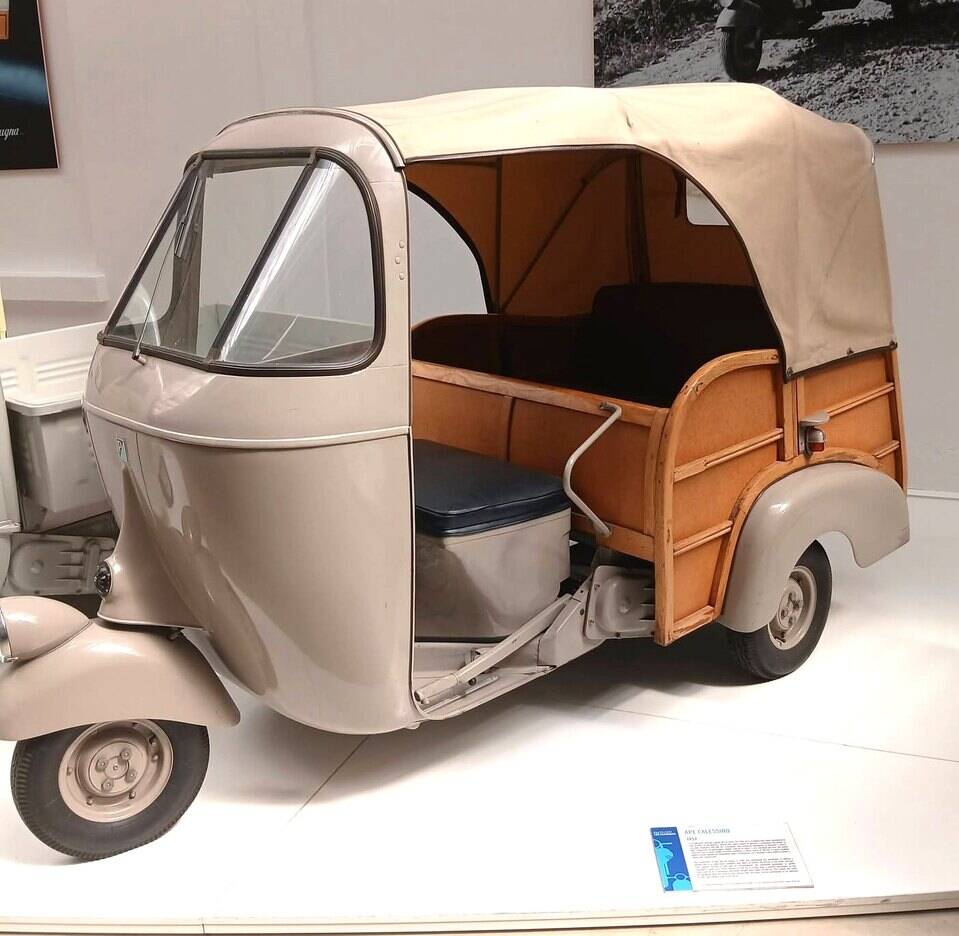 Exact Calessino passenger/goods body photographed as a 1957 vehicle, one year later than the 1956 Ape 150 AC profile; engine displacement and trim are not established by the image page.