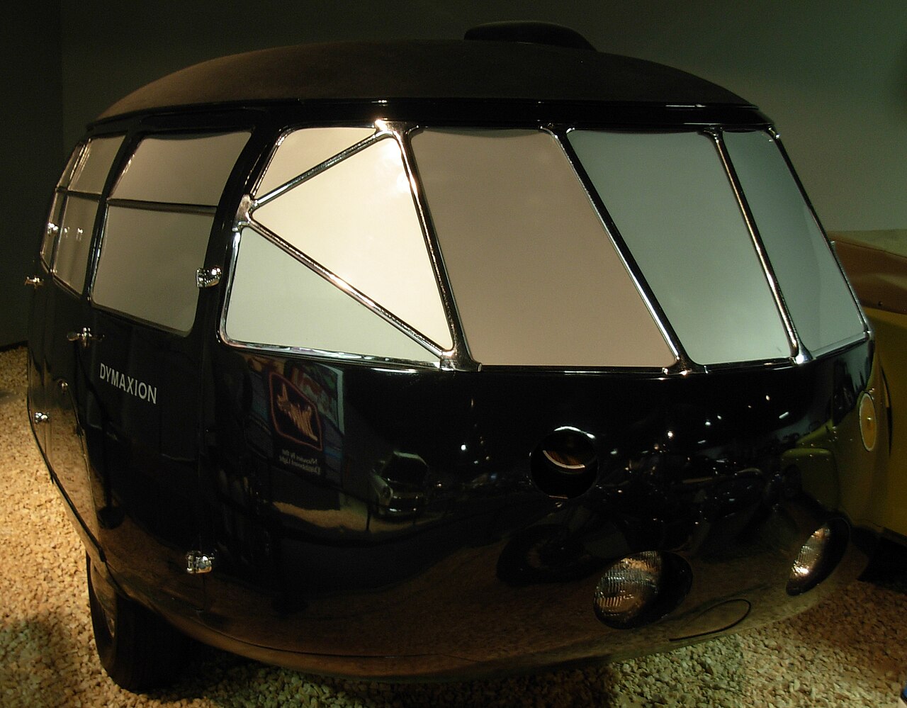 Black 1934 Dymaxion Car No. 2 displayed at the National Automobile Museum, viewed from its rounded front-left corner.