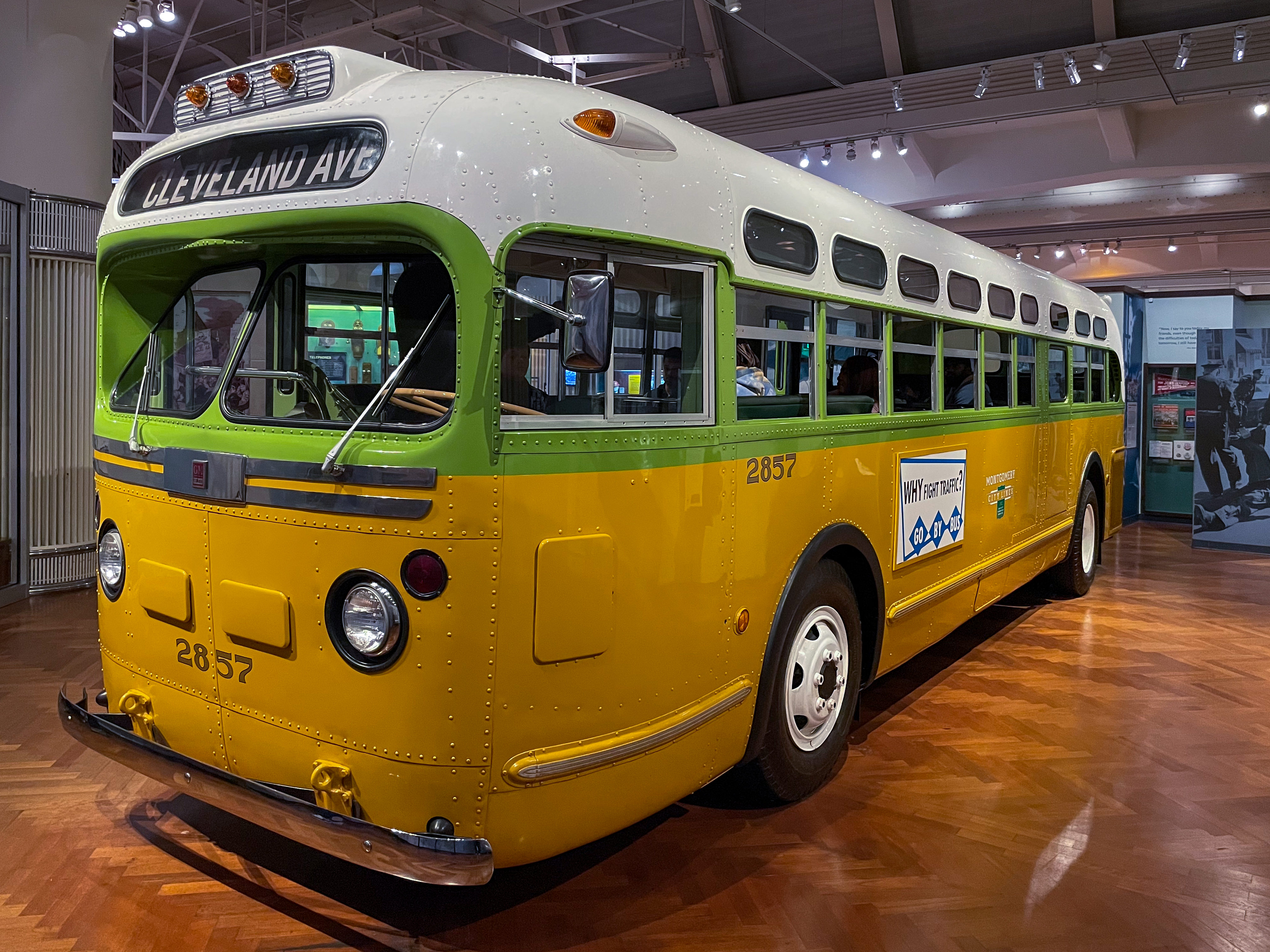 Restored green, yellow and cream 1948 General Motors transit bus no. 2857 displayed at The Henry Ford, viewed from the front left.