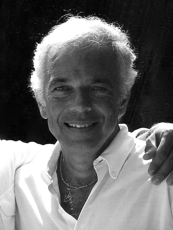 Ralph Lauren smiling in a black-and-white identification portrait.