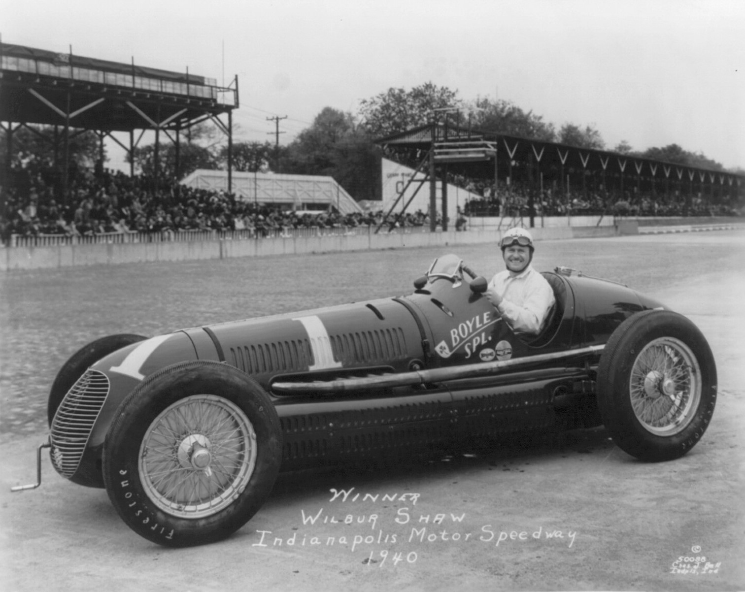 Wilbur Shaw smiling from the cockpit of the Boyle Special during qualifying for the 1940 Indianapolis 500.