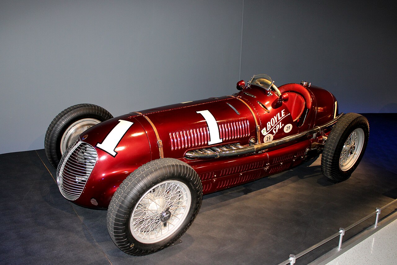Wilbur Shaw’s actual maroon Maserati 8CTF Boyle Special serial 3032 displayed at the Indianapolis Motor Speedway Museum in restored 1940 livery.