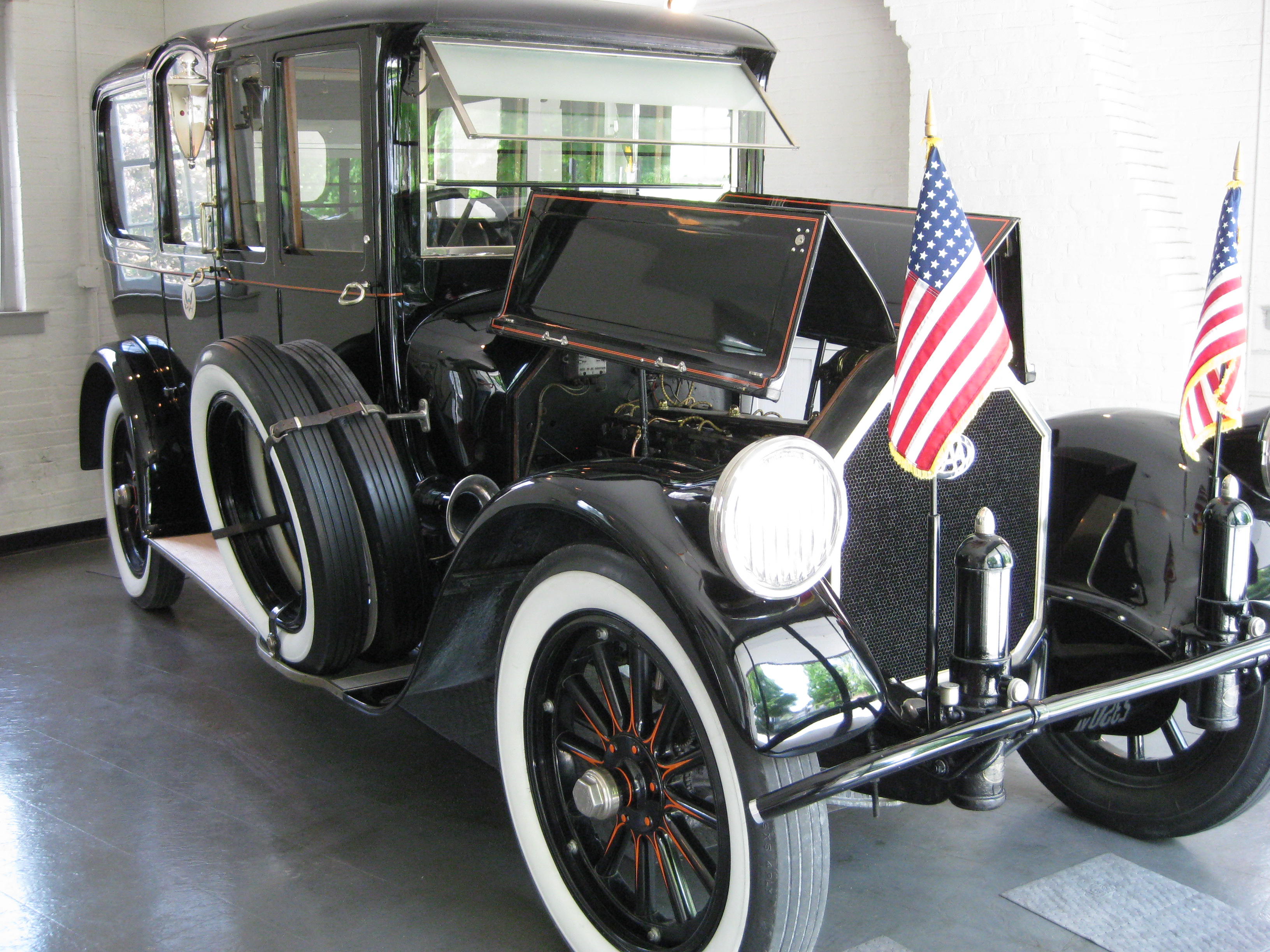 Black 1919 Pierce-Arrow Series 51 presidential limousine displayed indoors at the Woodrow Wilson Presidential Library, viewed from the front left.