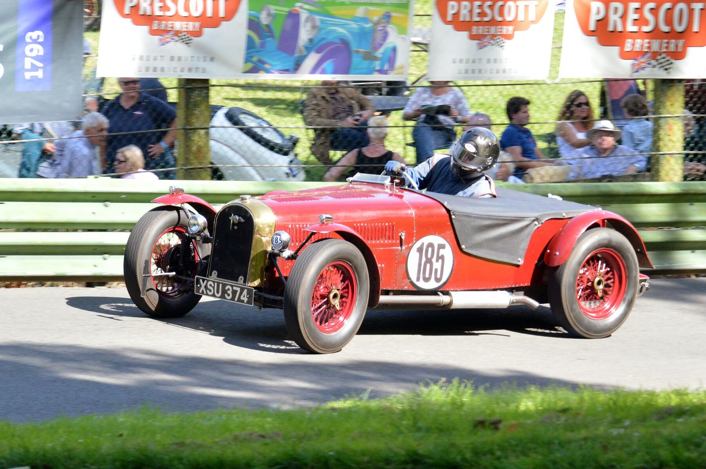 The source identifies a 1936 Morgan/Riley 4/4, matching the profiled year and model family. It is a competition-prepared car with a 1,496 cc Riley engine, not the standard 1,122 cc Coventry-Climax road-car powertrain described on the page.